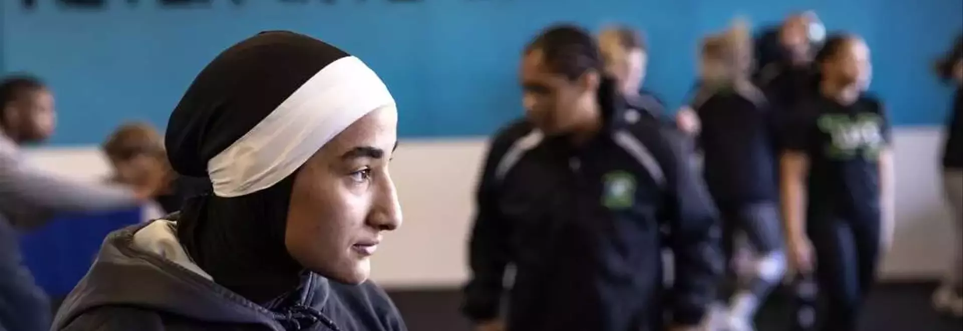 Sisters Revolutionize Women's Wrestling with Faith-Based Uniforms