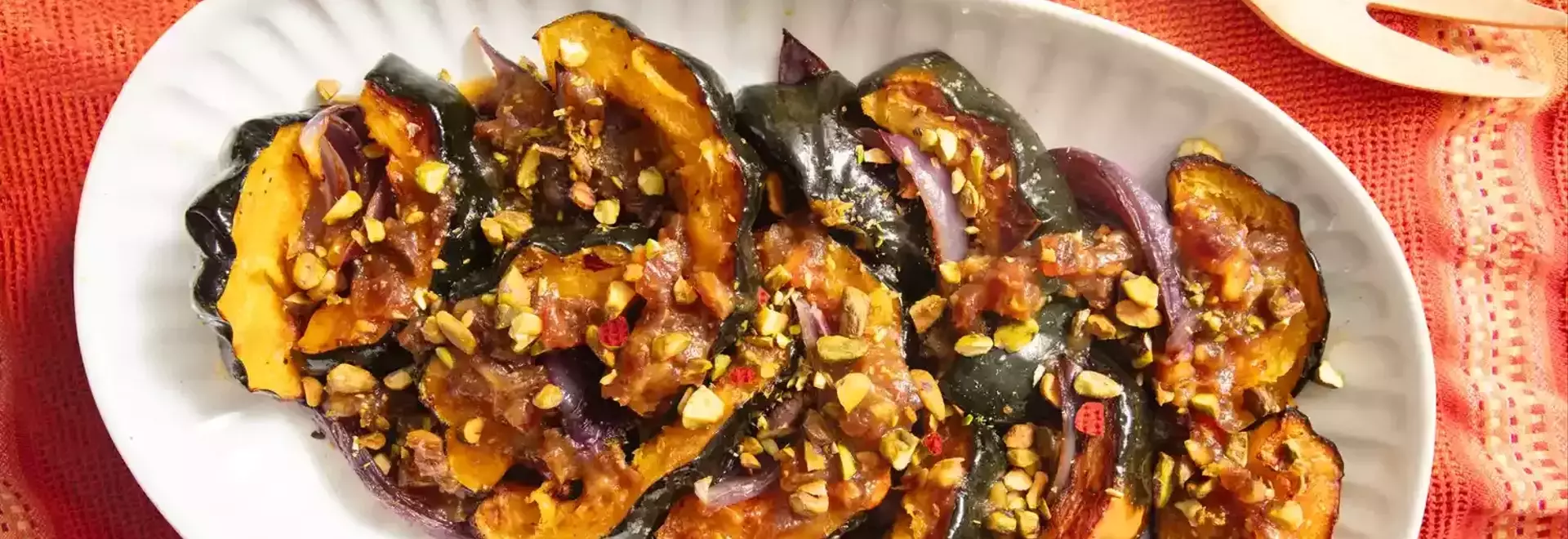 Culinary Harmony: Roasted Acorn Squash with Caramelized Red Onions and Honey-Date Vinaigrette