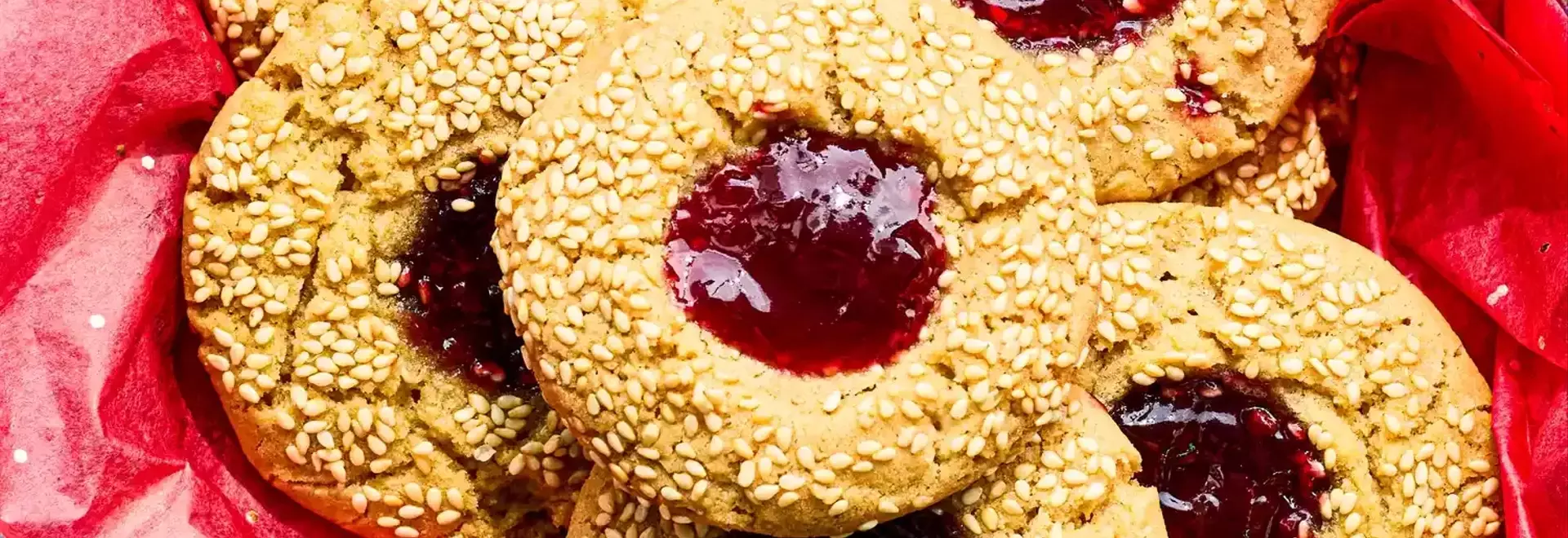 Delectable Tahini Thumbprint Cookies with Raspberry Jam