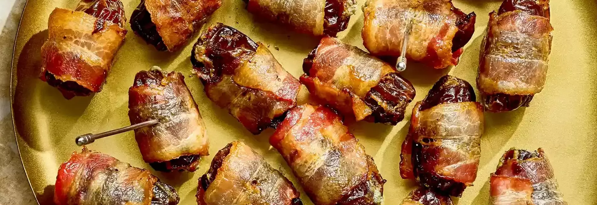 Elevate Your Holiday Appetizers: Three-Ingredient Bacon-Wrapped Dates with Blue Cheese