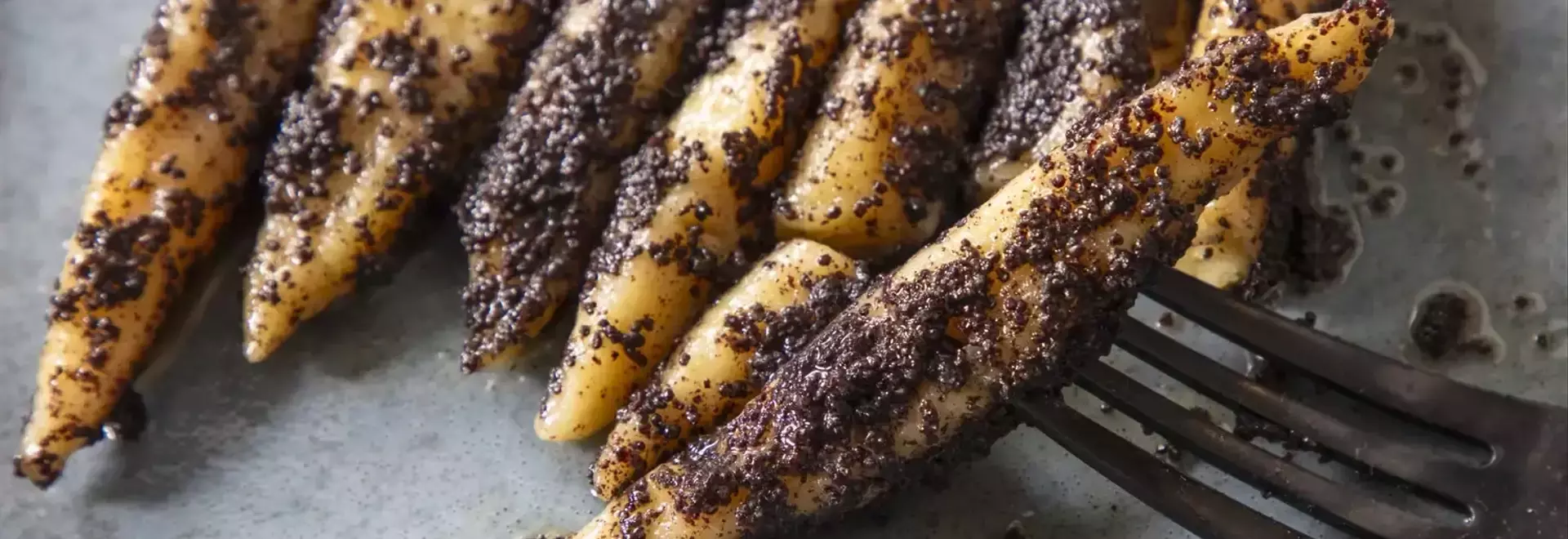 Exploring Mohnnudeln: Austrian Potato Dumplings with Sweet Poppy Seed-Butter Sauce