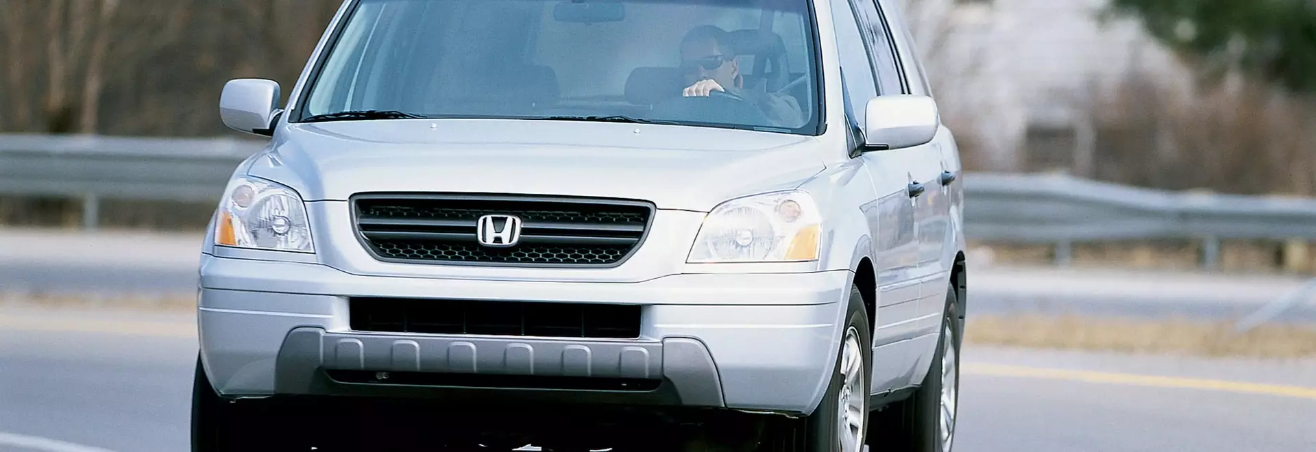 A Comprehensive Look at the 2003 Honda Pilot EX: Redefining the Mid-Size SUV Segment