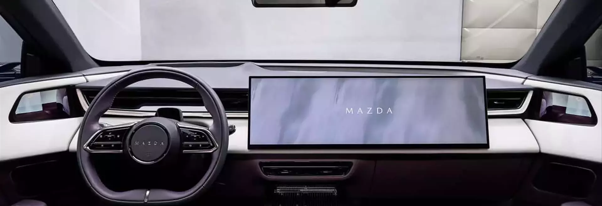 Mazda Defends Large In-Car Screens, Prioritizing Driver Focus with Head-Up Displays