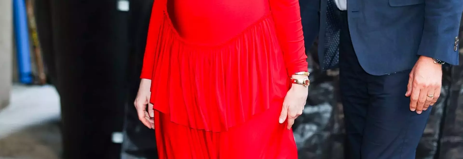 Anne Hathaway's Bold Maternity Style Debut in Red
