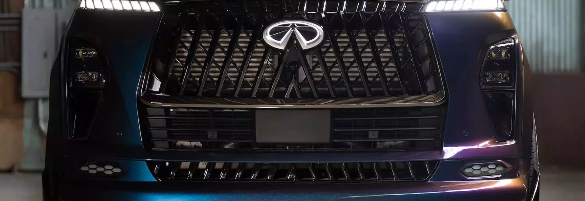 Infiniti QX80 Red Sport: A Refined Battle Against Mercedes-AMG and BMW M