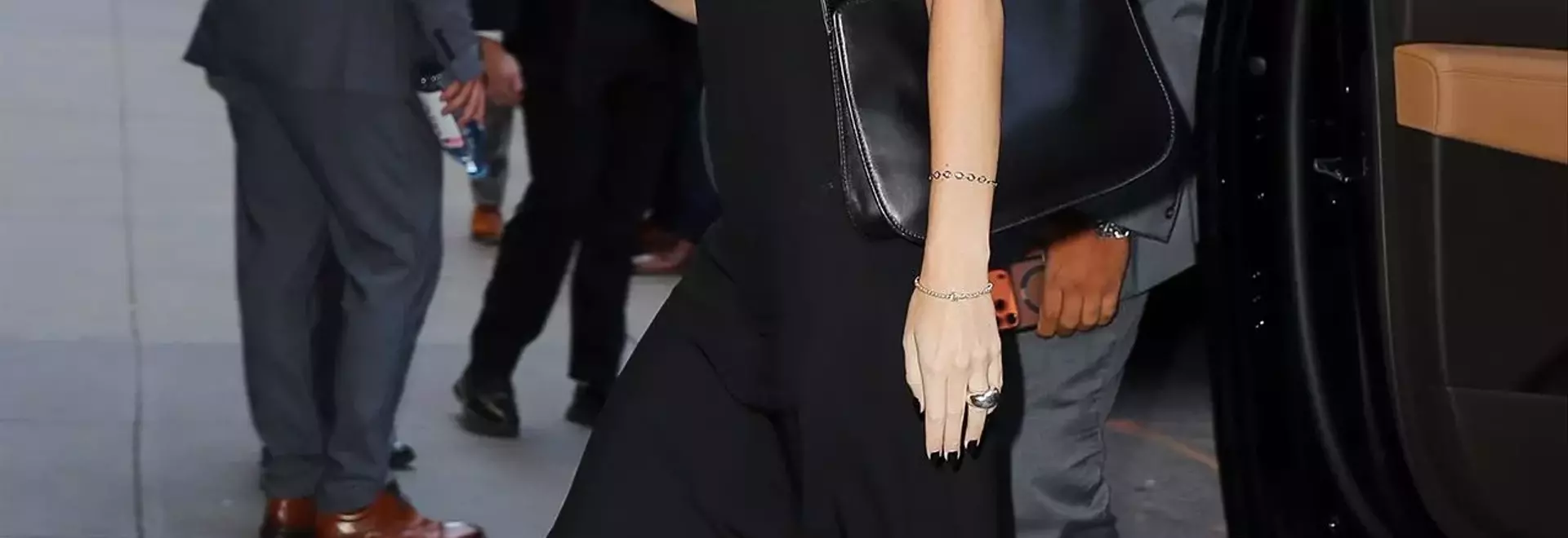 Dakota Johnson's Unexpected Summer Footwear Choice: The Wedge Flip-Flop