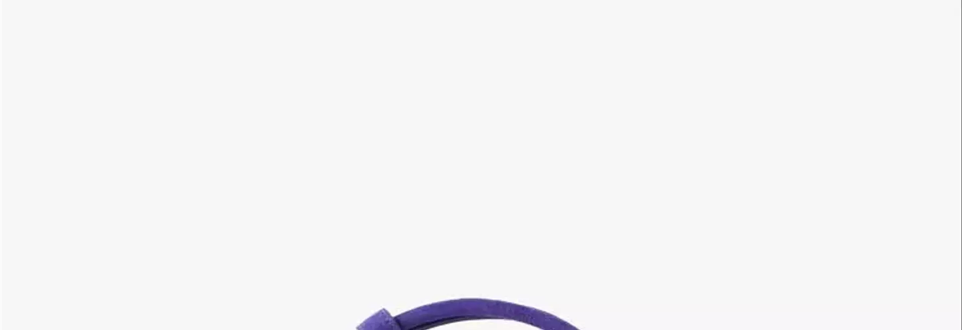 Fashion Week's Defining Trends: Purple Hues, Statement Brooches, and Inventive Styling