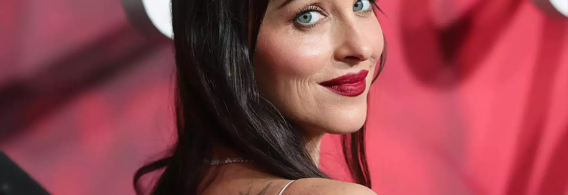 Dakota Johnson Revives Precision Red Lip at "Verity" Premiere